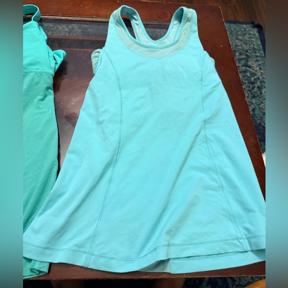 Pair of Lululemon Athletica Aqua Racerback tanks